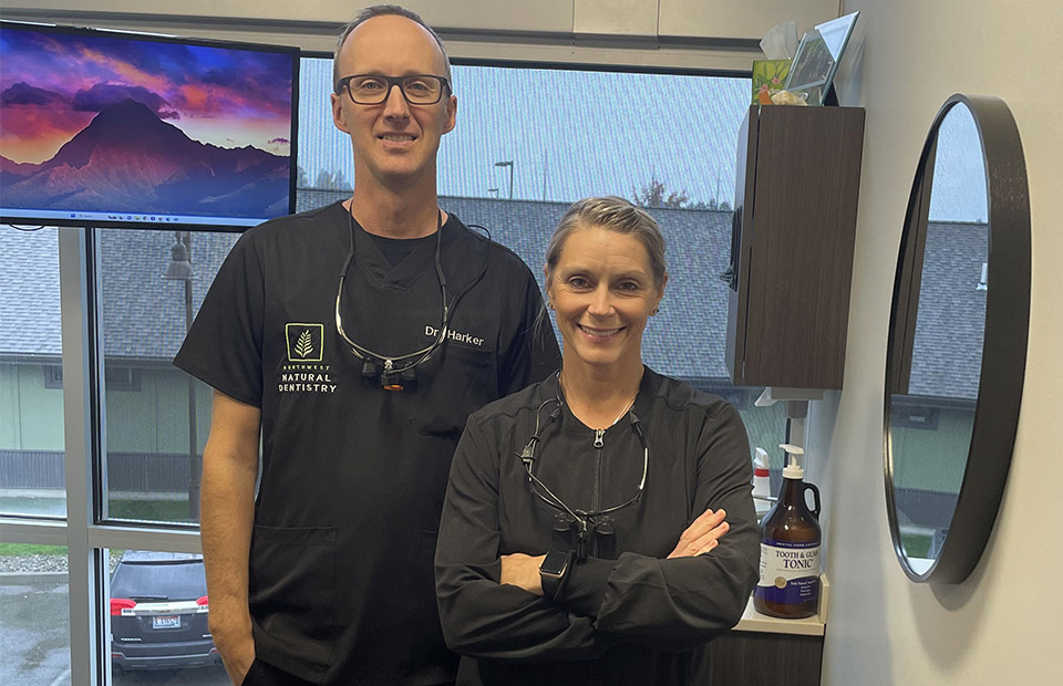 the doctors at Northwest Natural Dentistry in an exam room smiling for the camera