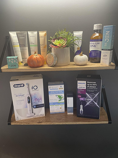 shelf with holistic preventive dentistry devices and products